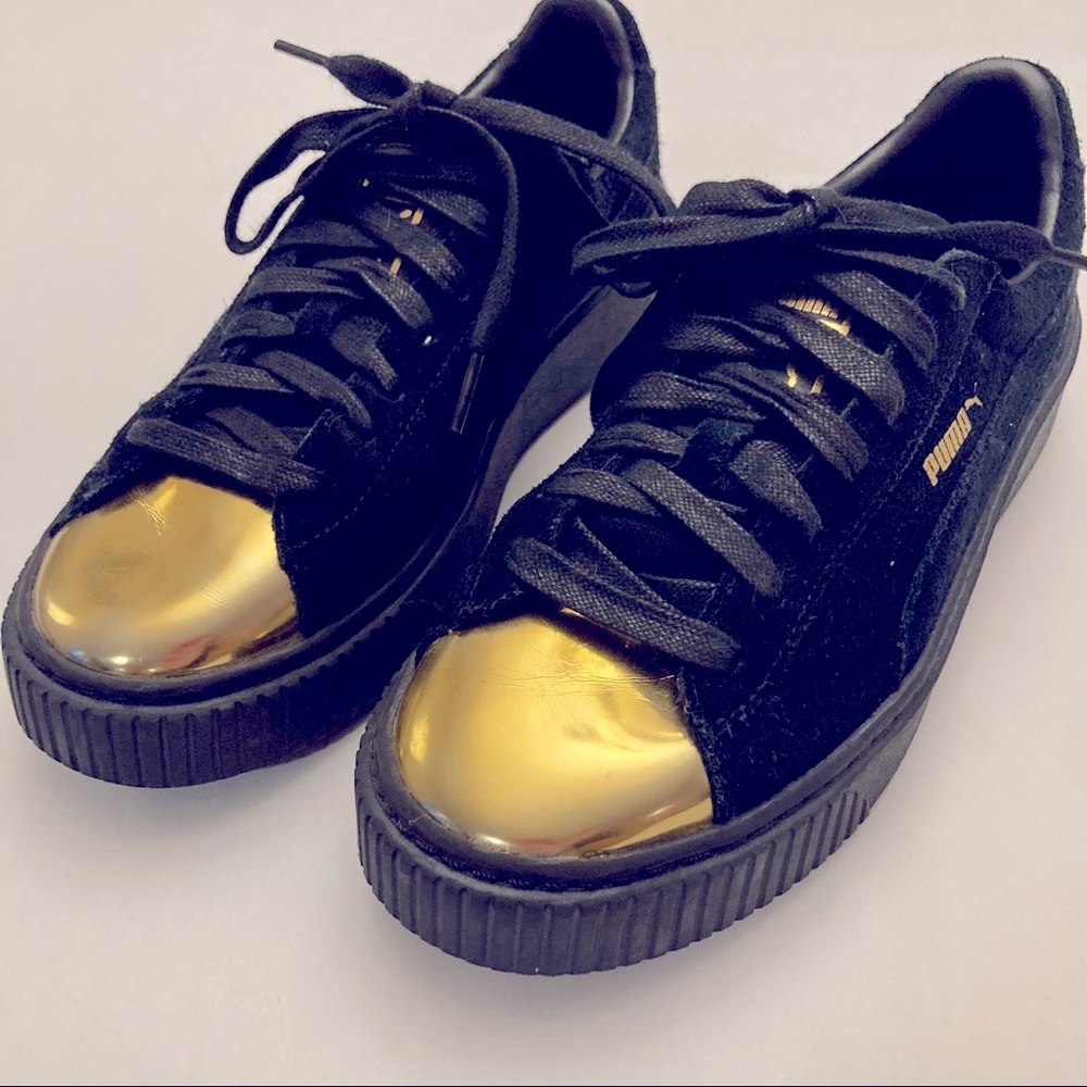 Puma black & gold platforms